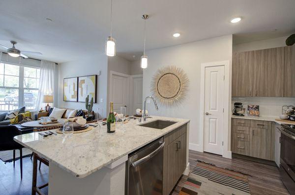 Marble countertops and stainless steel appliances.