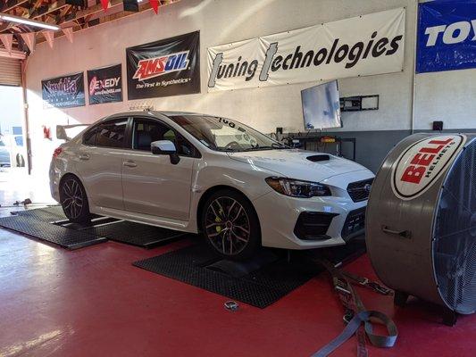 Beautiful brand new STI getting calibrated.