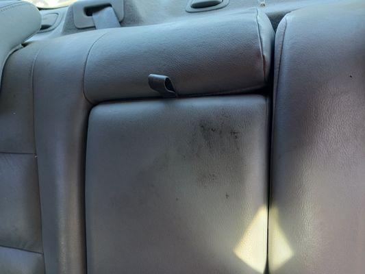 Greasy handprint from when they took out my back seat to remove my fuel tank.