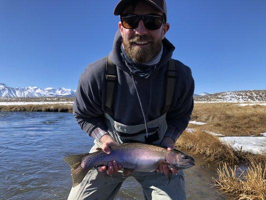 Friend And client Ryan with a beautiful Upper Owens Rainbow Trout.