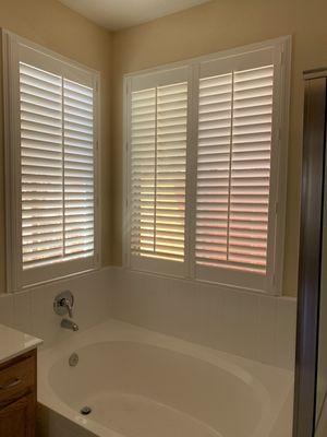 Added plantation shutters to master bathroom