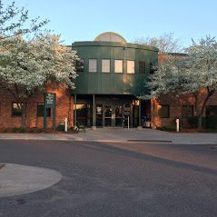 Spring view of the entrance from the back of the building.