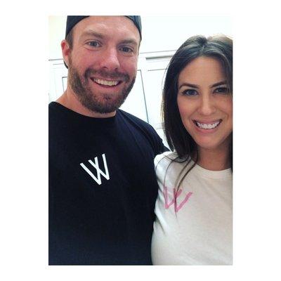 The owner and her boyfriend wearing Wax It BAbe shirts