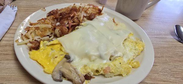 Vegetarian Veggie omelet with extra crispy hashbrowns