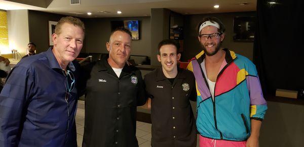 Charity poker fundraiser client Clayton Kershaw poses with Poker People dealers and Orel Hershiser.