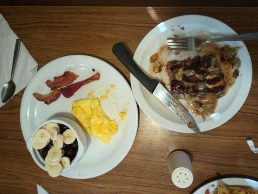 Rare steak, scrambled eggs, Bacon and fruit