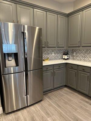 Clean kitchen from a different angle.