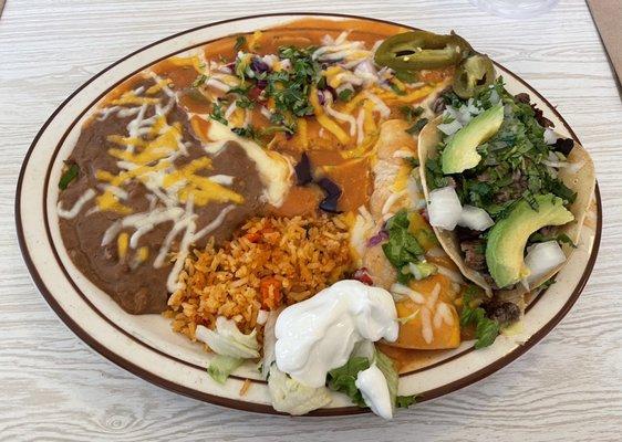 Combo plate with chile relleno, carne asada taco and chicken enchilada 8/10