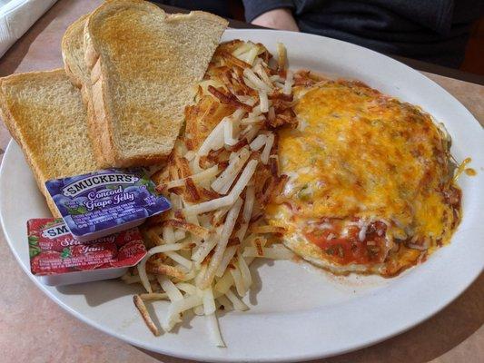 Huevos rancheros - two perfectly cooked eggs under that delicious cheese