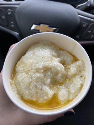 Grits drenched in butter when I asked for NO butter.