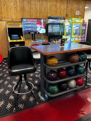 One of the structures holding the bowling balls.