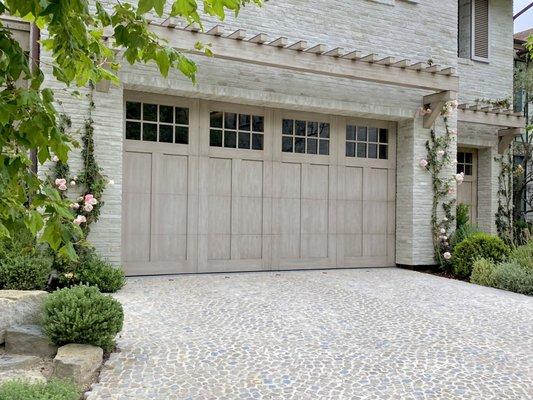 A traditional wood garage door custom built for Patterson Custom Homes in Newport Beach.