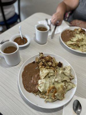 Chilaquiles poblanos gratinados ( melted white cheese) w shredded chicken.