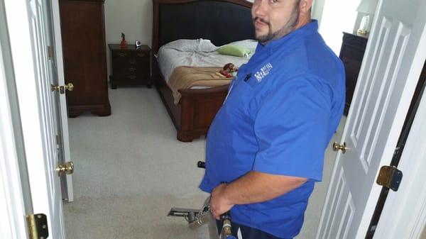 Mike cleaning carpets