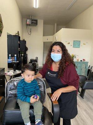 Getting his first haircut!