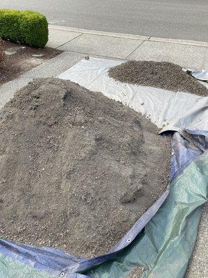 3 way premium topsoil plus the mound of rocks, broken glass and more trash sifted from the premium topsoil