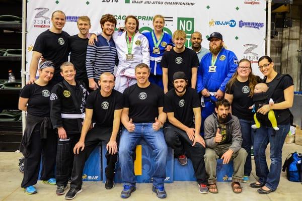 Members of the URSA Academy competition team on the medal podium at the IBJJF Chicago Open.