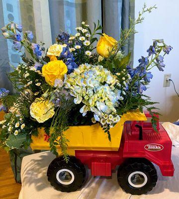 75th Anniversary Tonka truck baby boy arrangement.