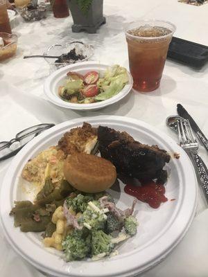 Meatloaf, chicken, broccoli salad, Italian green beans, Mac and cheese, squash casserole, roll, Fuji apple salad, Oreo cake. Crazy amazing.