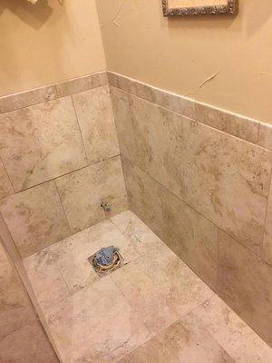 Tile wainscoting in bathroom.