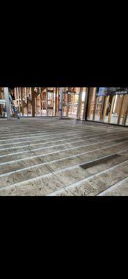 Radiant floors stapled to sub-floor with a gypcrete
pour over.