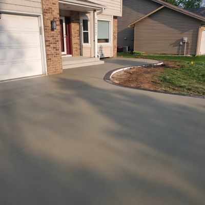 Driveway, sidewalk, steps and patio.