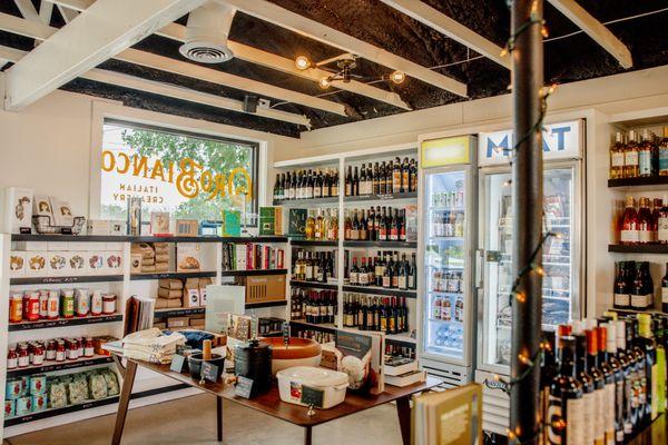 Step into our shop for an expertly curated selection of Italian and Texas wines, perfectly paired with our premium Italian gourmet products.