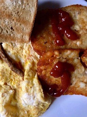 The sausage, scramble, and hash brown platter comes with toast. $6