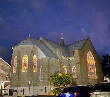 Outside photo of church with beautiful stain glassed windows