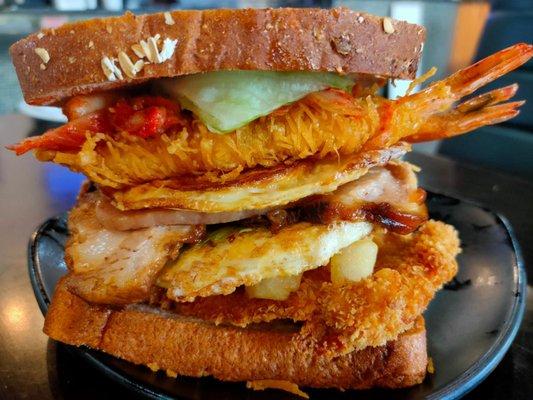 Heart attack special! Whole wheat bread, lettuce, Kim Chee, katsu shrimp, charsiu, eggs, fries, katsu Chix and masubi.