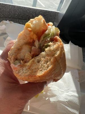 Chicken tender sub, ex mayo, ketchup, cheese, lettuce, tomatoes, onions, peppers, salt and pepper. Better than the chicken place next door.