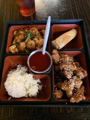 Bento box lunch- sesame chicken, shrimp stir-fry, egg roll and white rice-$9.99. Chicken was tasty and flavorful- NOT all breading.