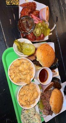 Brisket sandwich, Tri tip sandwich, Mac and cheese, potatoe salad. Sausage links.