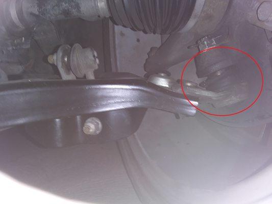 you see lower ball joint bushing ripped off? don't even have oil or grease left in it. It does not absorb any impact. You call it safe?