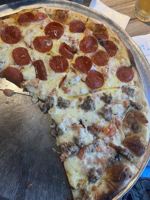 Margherita Pizza plus pepperoni and sausage