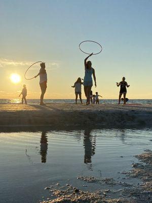 Group class on the beach with Surfside Hooping