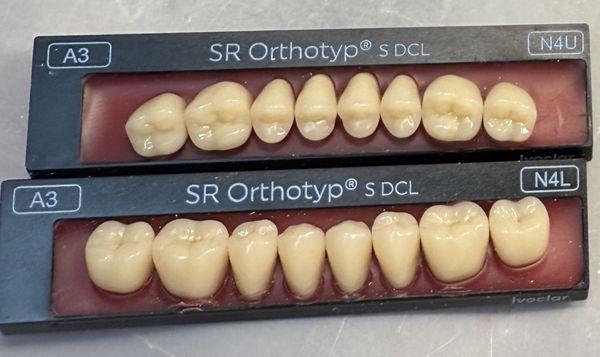 There are the teeth used for the dentures, how they just come to us, and on the left upper corner is there shade