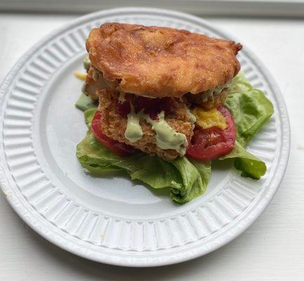 A true Trini favorite: Bake and shark! Served with fresh veggies and a zesty garlic aioli.