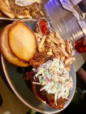 Nashville hot chicken sandwich & pulled pork poutine in the background