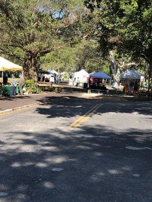 View of one of the vendor aisles in the shade