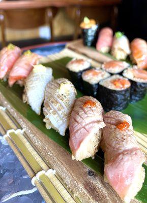 In the front: Toro trio - chefs's choice of 3 types if fatty fish belly of the day (2 pcs each) (07/2024)