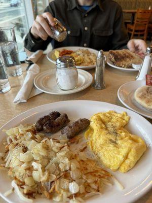 Sausage eggs potatoes n muffin!