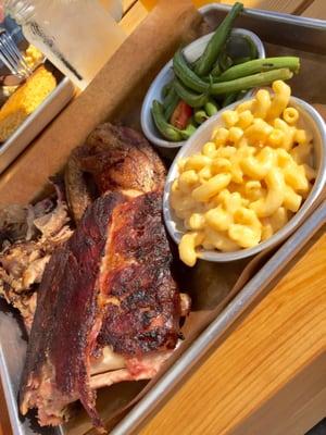 Choose Three: ribs, chicken, bbq pulled pork.Green beans tasted fresh and Mac n cheese was ok.  Good pork!