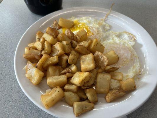 Hash Browns and eggs over medium