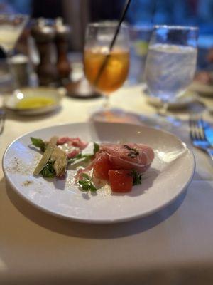 Two of the appetizers shared..  Fresh Buffalo Burrata (right) Carpaccio All'italiana (left) . The Carpaccio All'italiana was outstanding!