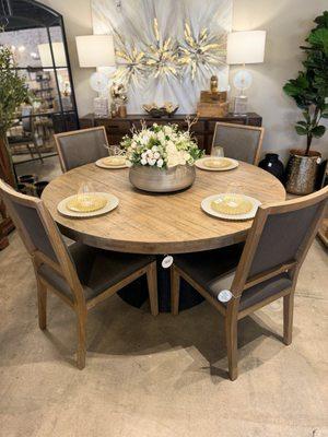 Beautiful round solid wood dining table -- natural top and black base