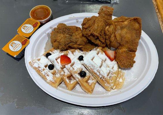 Chicken and waffles with fruit toppings