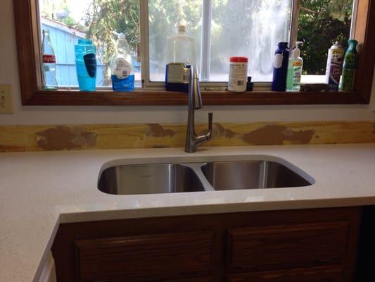 Our undermount sink with our new countertops