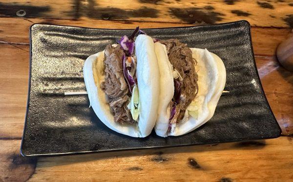 Beef brisket Bao buns with pickles on side