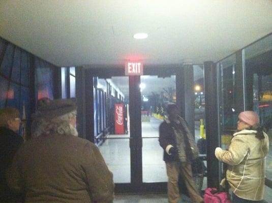 These are people waiting for a Greyhound that is over two hours late.